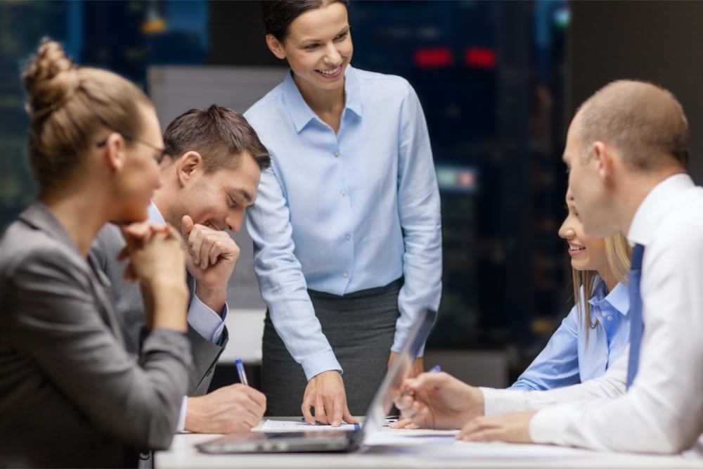 Boss-in-meeting-with-employees