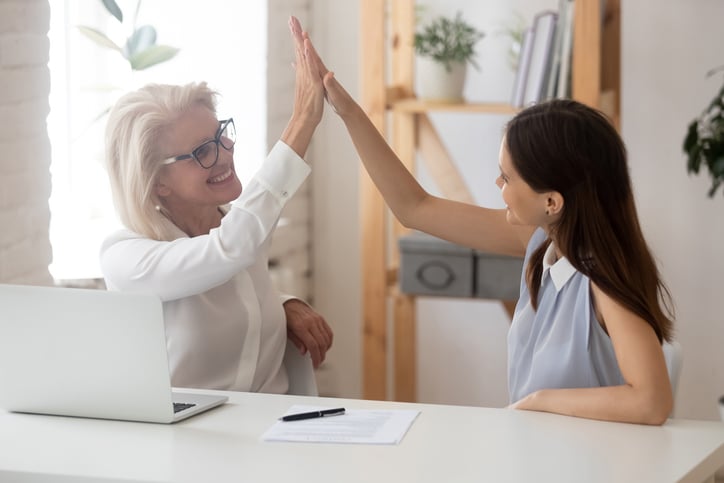 High-five-employee-and-boss